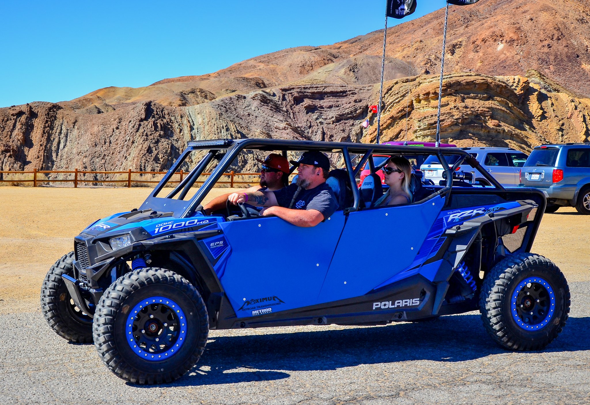 A four-seat side-by-side with driver and passengers at Calico Ghost Town, CA