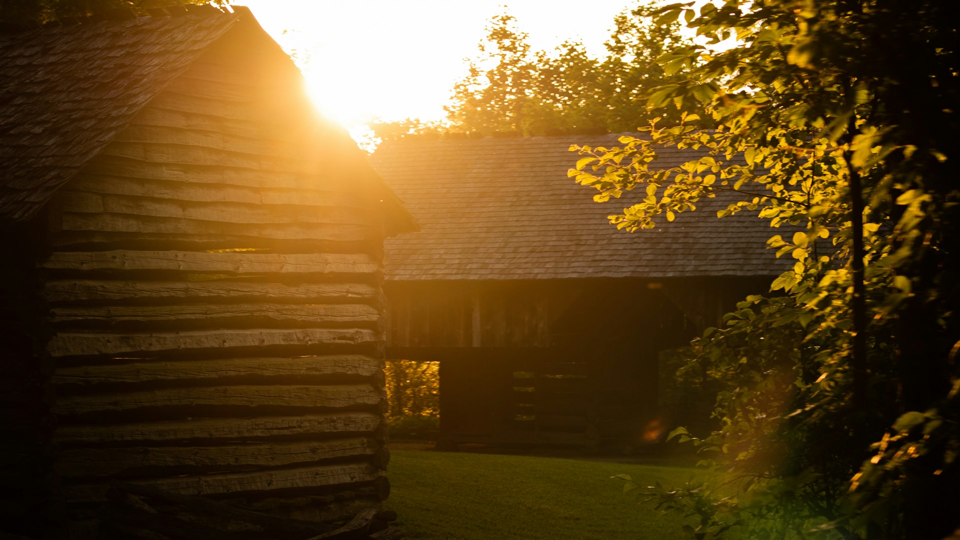 Log buildings on the Cades Cove loop at sunset