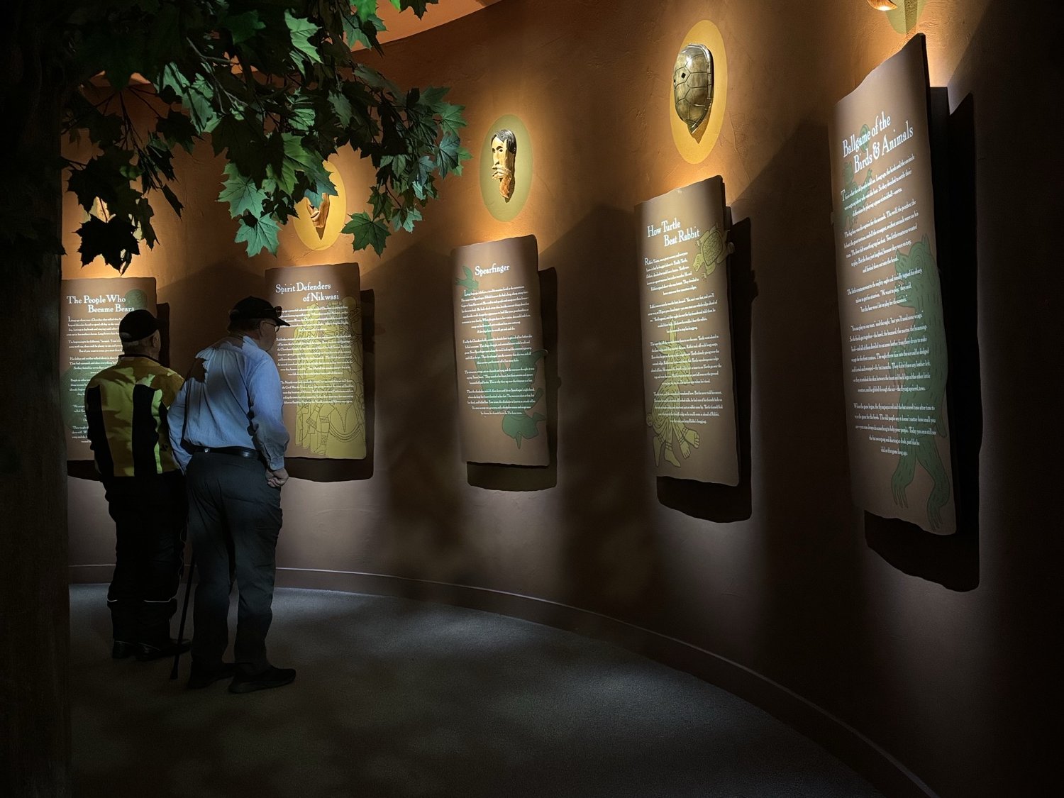 Panels of Cherokee stories inside the Museum of the Cherokee People