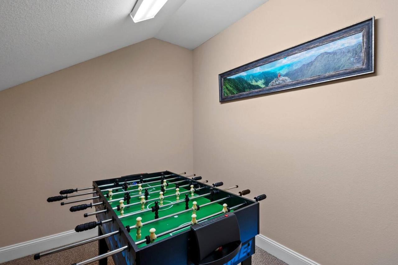 The upstairs nook set up with a foosball table for rainy afternoons · © Creekside Cottage
