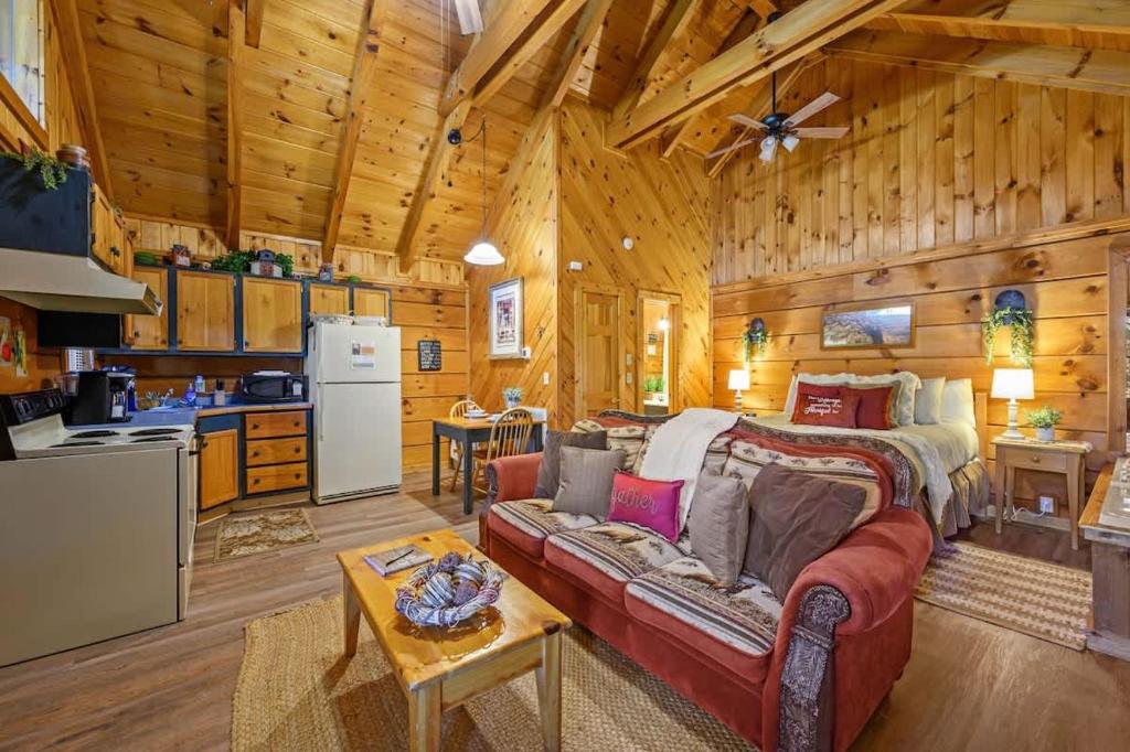 Kitchen, dining table and bed sharing the one open room · © Do Not Disturb