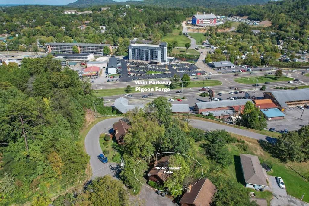 Aerial view of the cabin just behind the Pigeon Forge Parkway · © Do Not Disturb