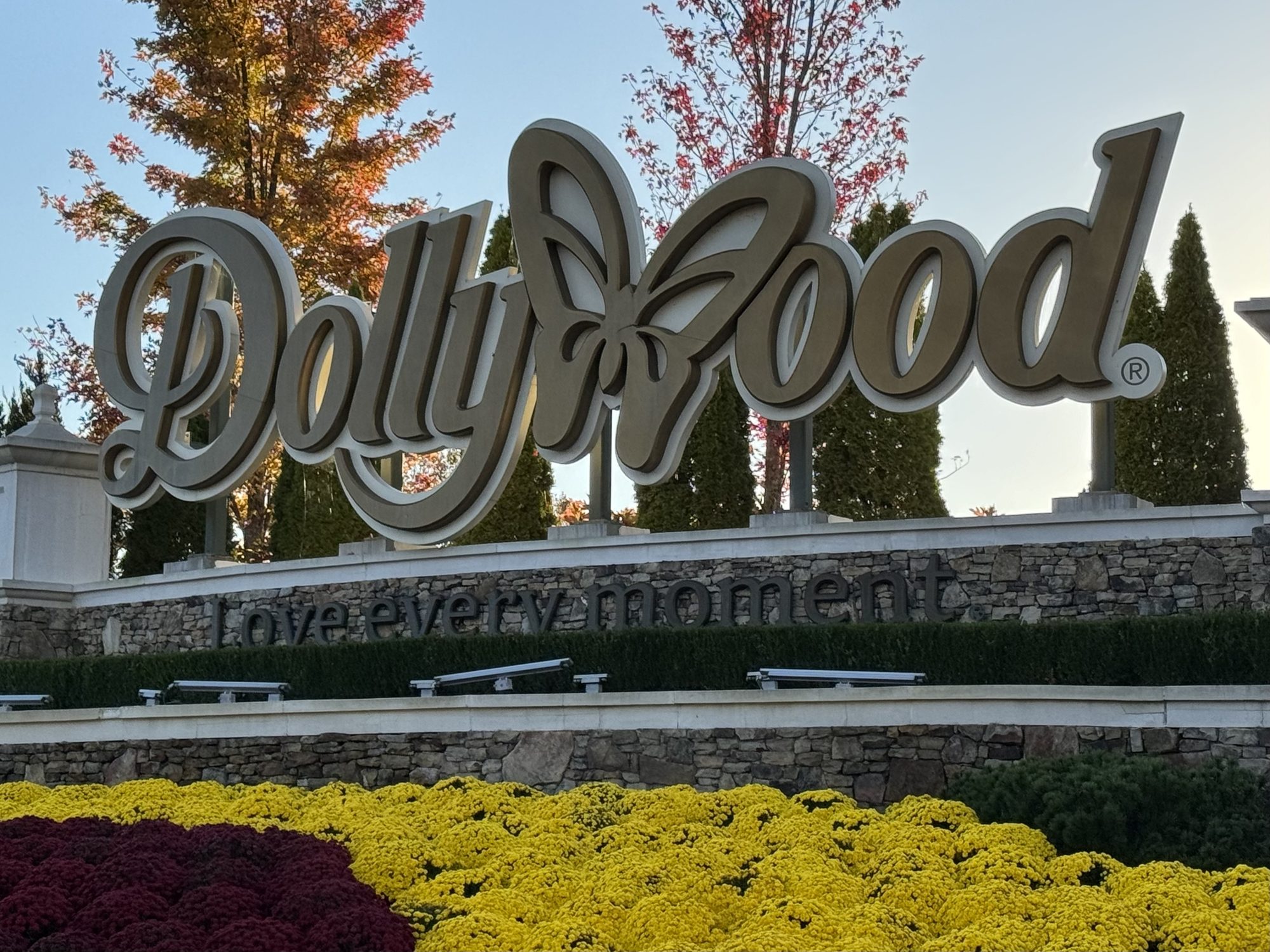The Dollywood sign and its autumn flower beds