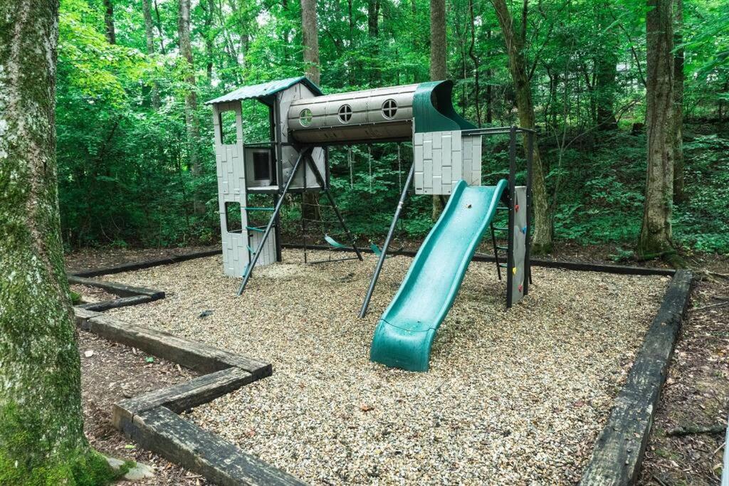 The shared playground in the community's common area · © The Helena Tiny Home