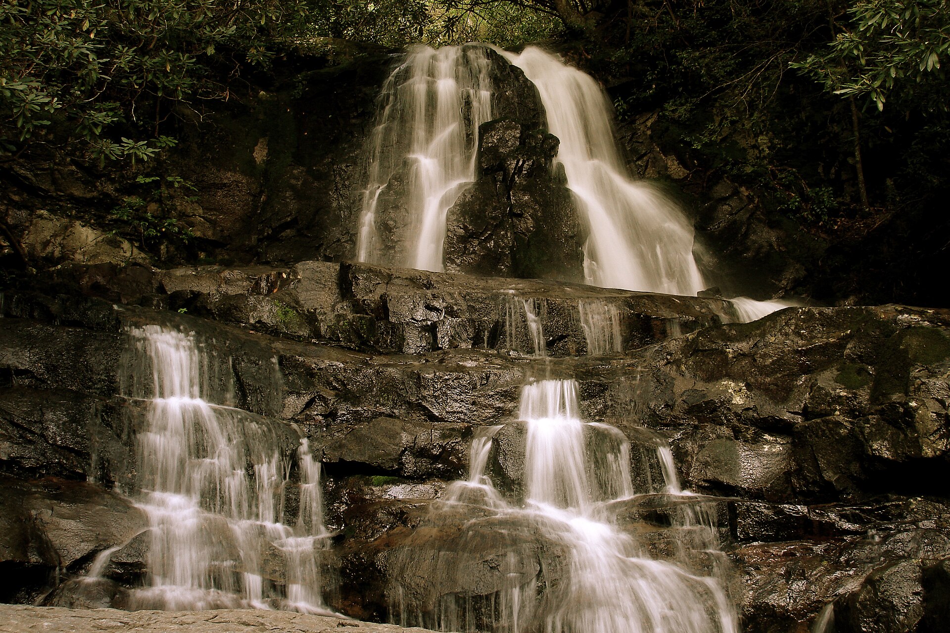 Water spilling over the ledge that splits the falls in two