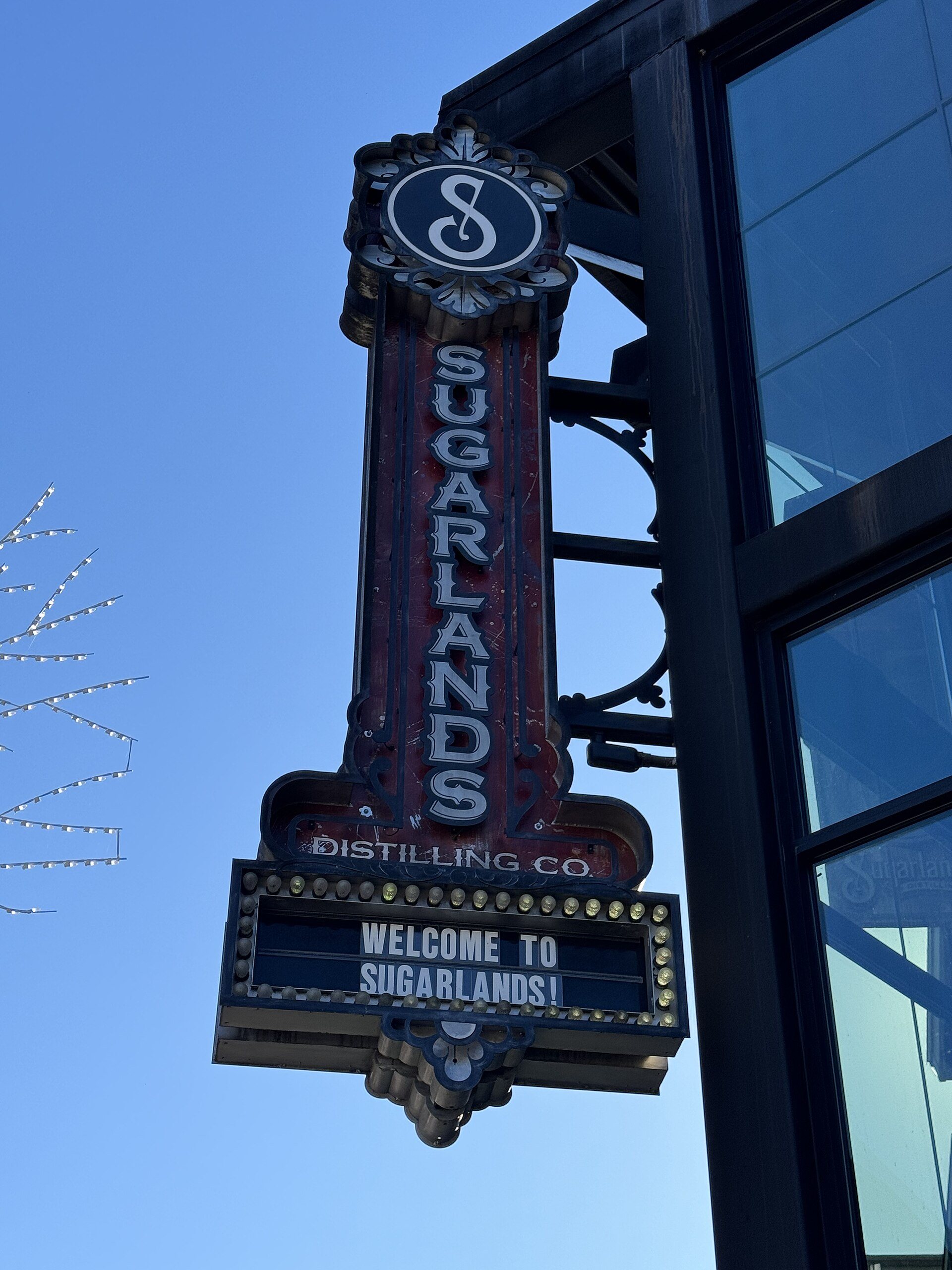 The marquee sign of Sugarlands Distilling Co. on the Gatlinburg Parkway