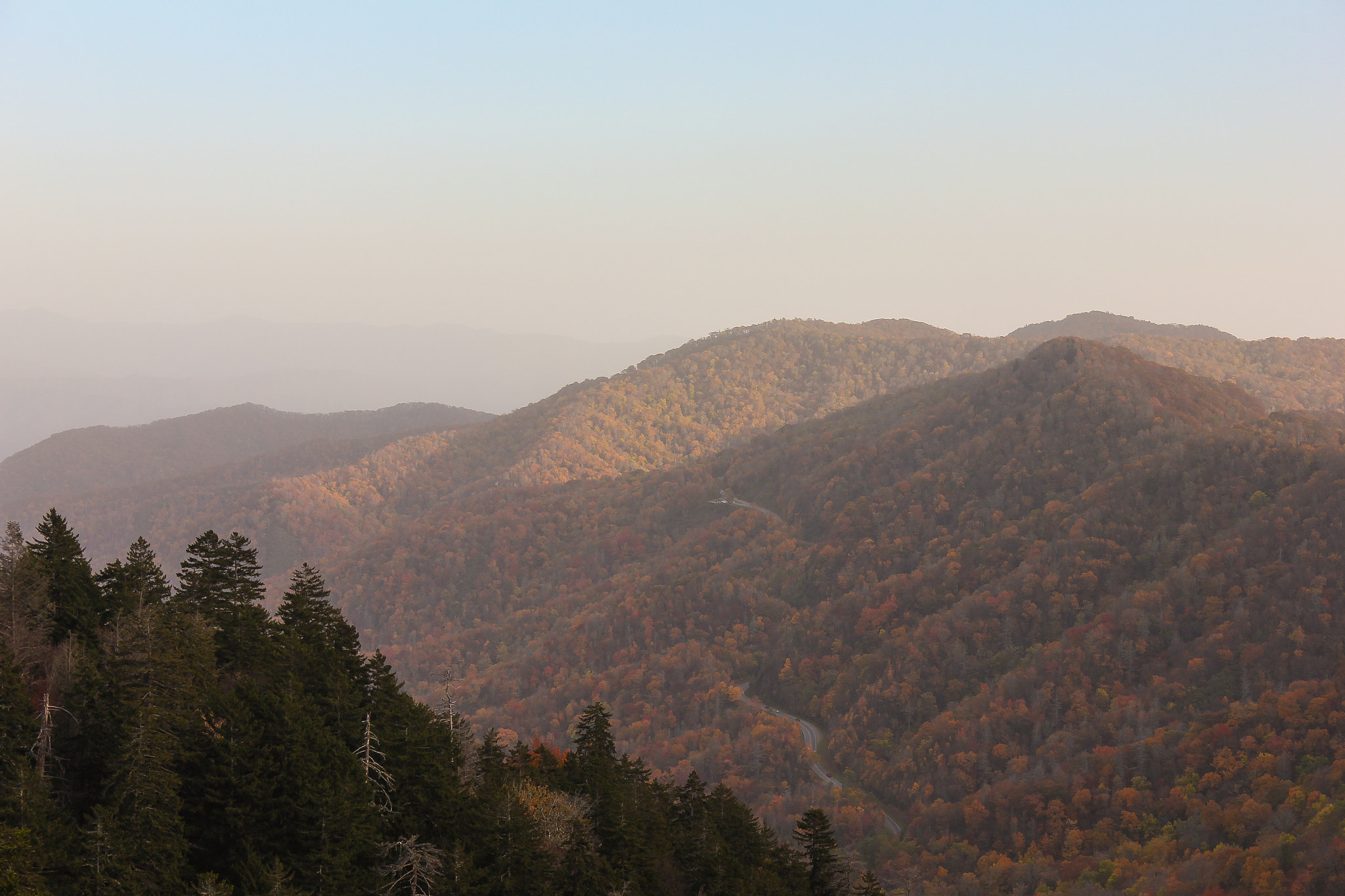 Newfound Gap Road winding through the haze towards the North Carolina side