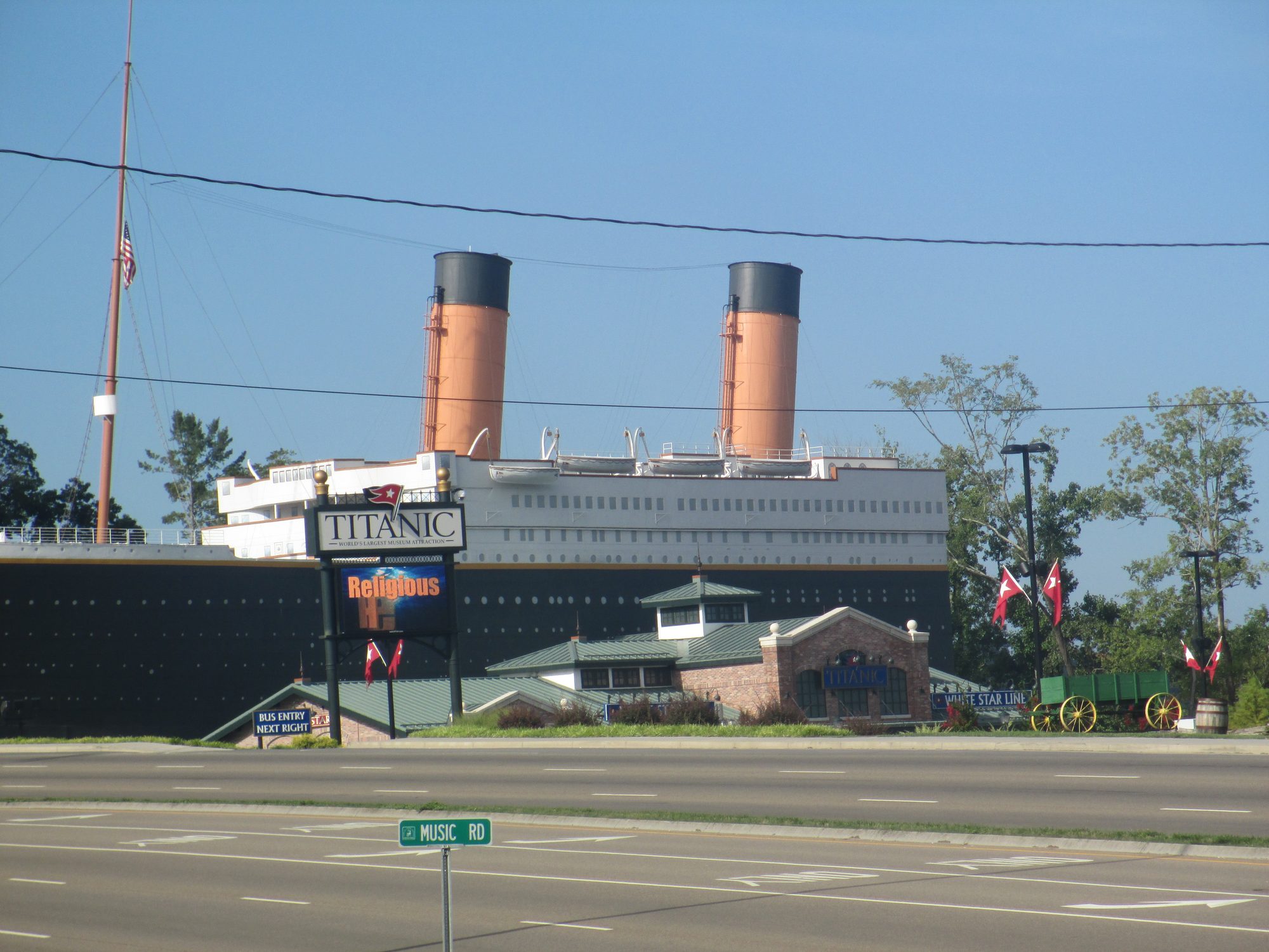 The ship-shaped Titanic Museum with its two funnels, seen from the Parkway